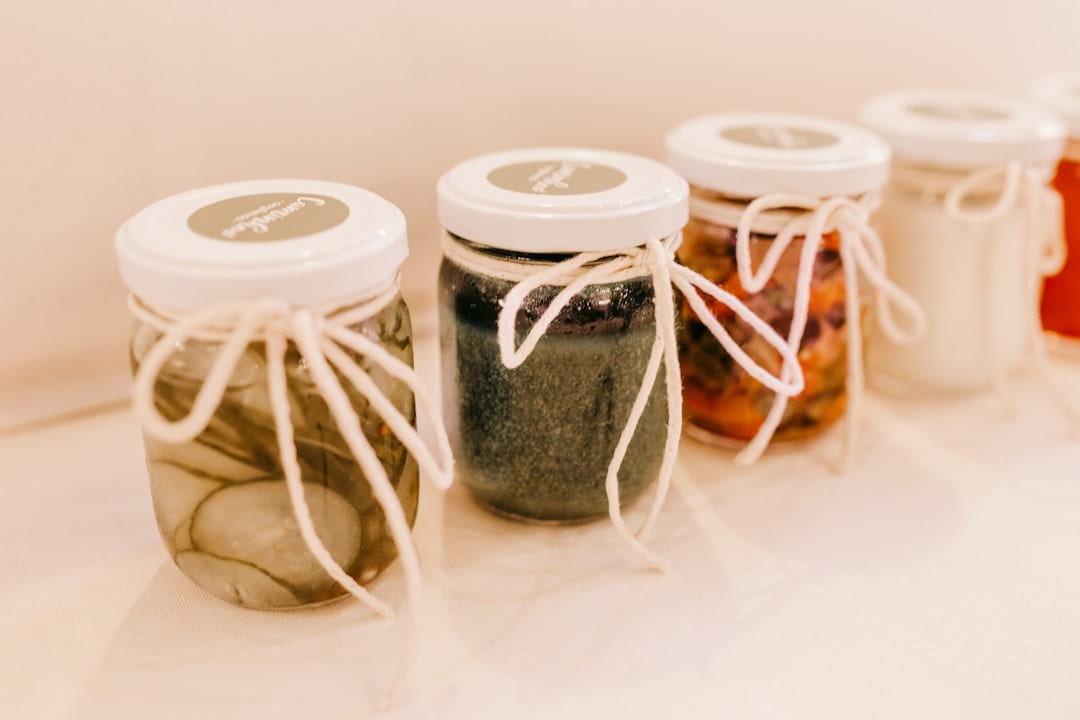 two white and clear glass jars on Earth Wise Budget