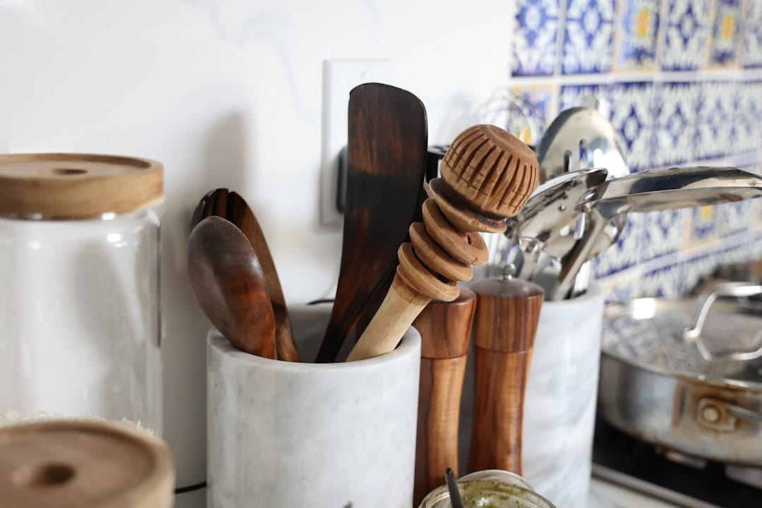 kitchen utensils in a cup on a counter on Earth Wise Budget