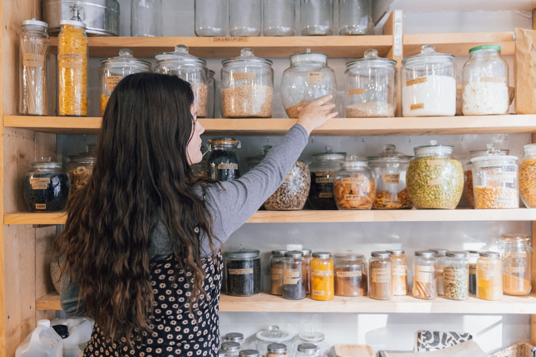 a person holding a jar of food on Earth Wise Budget