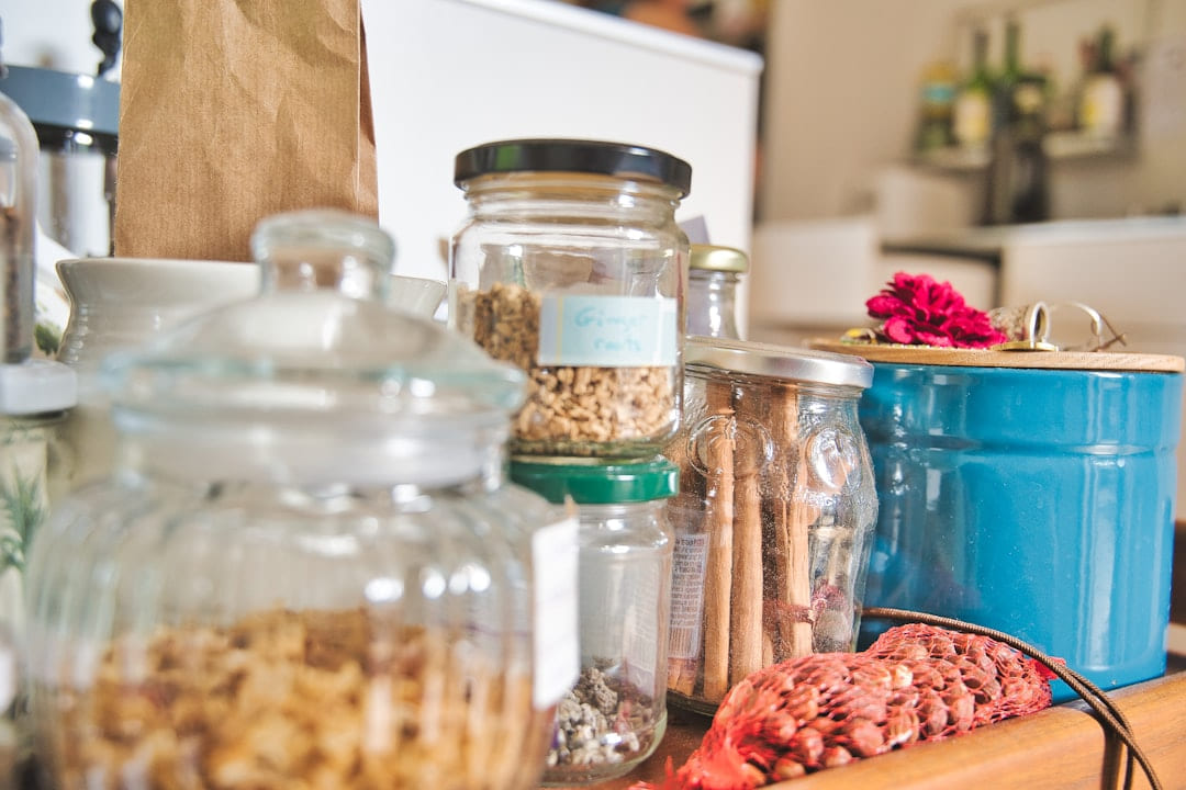 clear glass jars with white and brown food on Earth Wise Budget
